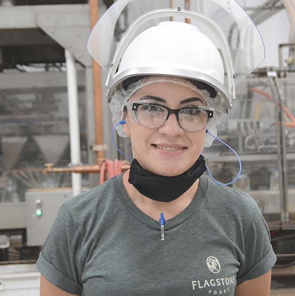 Employee from Flagstone El Paso plant smiling for camera